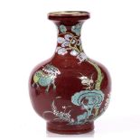 A Chinese porcelain vase Daoguang circa 1840 of sang-de-boeuf ground, with enamelling in yellow