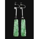 A pair of Chinese jade ear pendants of rectangular form mounted with two button shaped 'pearls'