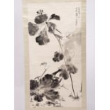 After Zhang Daqian A Chinese hanging scroll depicting lotus, signed