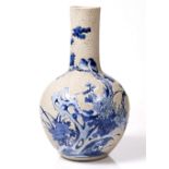 A Chinese blue and white porcelain bottle vase 19th Century decorated with birds and flowering