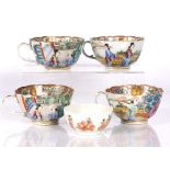 Four Chinese Canton enamel tea cups and a small bowl painted in enamels with immortals (5)
