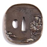 A Japanese bronze tsuba Court official on a horse, 7.5cm