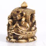 A Japanese ivory okimono netsuke carved as the Shichifukin late Meiji aboard the Takarabune, on