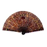 A Cantonese tortoiseshell fan mid 19th Century of twenty-one sticks pierced and carved with a