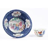 A Chinese export porcelain circular bowl Qianlong (1736-1795) the centre panel painted in famille