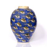 Large pottery vase Persia of blue ground decorated with fish 42cm
