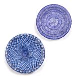 Two contemporary Islamic dishes 20th Century the largest with with a diamond pattern meeting in