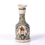 Pottery hookah base Qajar of blue ground with reserve panel with courtier's head 29cm high