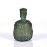 Glass bottle Persian, 9th/10th Century wheel cut engraved scroll pattern, with old traces of gold