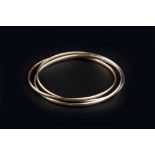 A 9CT THREE COLOUR GOLD BANGLE, comprising three entwined hoops of yellow, white and rose gold,