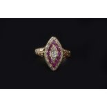 A RUBY AND DIAMOND PANEL RING, the navette-shaped panel with alternate rows of rose and lasque-cut