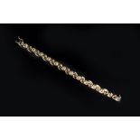 A 9CT GOLD FANCY-LINK BRACELET, length 18.5cm
