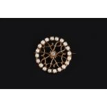 A DIAMOND AND CULTURED PEARL PANEL BROOCH, the scrolled openwork panel centred with a round