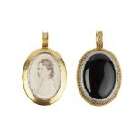 A VICTORIAN ONYX AND ENAMEL MEMORIAL LOCKET PENDANT BY PHILLIPS BROTHERS & SON, circa 1870, the oval