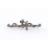 A PEARL, SAPPHIRE AND DIAMOND SET BAR BROOCH, the uniform knife-edge bar applied with a three-leaf