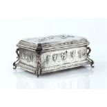 A LATE 19TH CENTURY CONTINENTAL SILVER CASKET, repoussé decorated with scenes of peasants