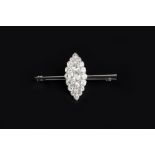 A NAVETTE-SHAPED DIAMOND PANEL BROOCH, the cluster of graduated old brilliant and brilliant-cut