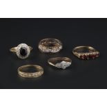 A COLLECTION OF GEM SET RINGS, comprising a diamond half hoop ring, 18ct gold mounted, a sapphire