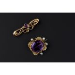 TWO AMETHYST AND PEARL SET BROOCHES, the first centred with an oval mixed-cut amethyst in beaded