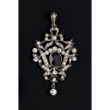 A COLLECTION OF JEWELLERY, comprising a purple and white paste pendant, of foliate cartouche design,