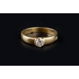 A DIAMOND SINGLE STONE RING, the round brilliant-cut diamond in part-collet setting, 18ct gold
