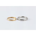 TWO WEDDING BANDS, comprising an engraved white precious metal wedding band, stamped 'Platinum',