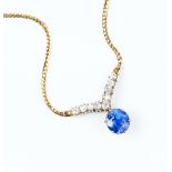 A SAPPHIRE AND DIAMOND PENDANT NECKLACE, the oval mixed-cut sapphire in later six claw setting,