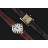 TWO LADY'S WRISTWATCHES, the first by Must de Cartier, with rectangular signed champagne dial and