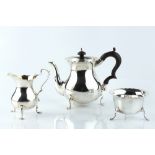 A MATCHED SILVER BACHELOR'S THREE PIECE TEA SERVICE, comprising teapot with ebonised handle and knop