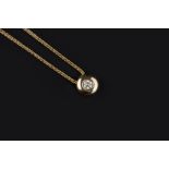 A DIAMOND SINGLE STONE PENDANT ON CHAIN, the round brilliant-cut diamond in rubover collet