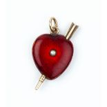 AN ENAMEL AND DIAMOND SET HEART PENDANT/PROPELLING PENCIL, the heart-shaped panel heightened with