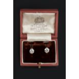 A PAIR OF DIAMOND SINGLE STONE EAR CLIPS, each round brilliant-cut diamond in six claw setting, to