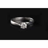 A DIAMOND SINGLE STONE RING, the round brilliant-cut diamond in four claw setting, 18ct white gold