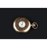 A 9CT GOLD HALF HUNTER POCKET WATCH, the white enamel dial with Roman numerals, subsidiary seconds