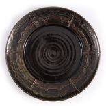 Ray Finch (1914-2012) at Winchcombe Pottery Dish tenmoku glaze, combed decoration impressed potter's