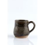 Katharine Pleydell-Bouverie (1895-1985) Mug incised pattern impressed potter's seal 8.5cm high.