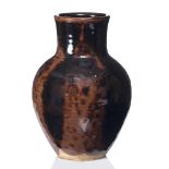 Ursula Mommens (1908-2010) Vase treacle glaze impressed potter's seal 22cm high.
