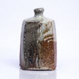 Lisa Hammond (b.1956) Vase facetted sides, soda glaze impressed potter's seal 26cm high.