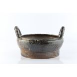 Jane Hamlyn (b.1940) Bowl with handles salt glazed impressed potter's seal 32cm across.