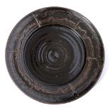 David Lloyd Jones (1928-1994) Charger tenmoku, with decoration to the wide rim 49cm diameter.