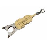 A GERMAN CIGAR CUTTER in the form of a miniature cello with silver metal mounts, 4.5cm long, closed
