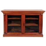 A VICTORIAN WALNUT LIBRARY DWARF BOOKCASE, the interior fitted shelves enclosed by two glazed