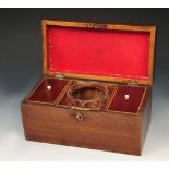 A GEORGE III MAHOGANY TEA CADDY with ring handle, twin compartments and mixing bowl, 30cm wide