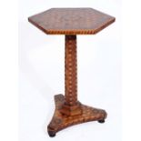 AN EARLY VICTORIAN HEXAGONAL PARQUETRY OCCASIONAL TABLE with geometric and cubic inlaid decoration