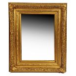 A LARGE ORNATE GILT FRAMED MIRROR 111cm high x 86cm wide