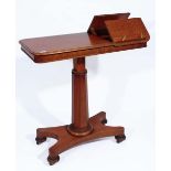 A VICTORIAN MAHOGANY READING TABLE with hinged flaps, height adjustable and on a hexagonal