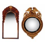 A REGENCY STYLE CONVEX WALL MIRROR with eagle surmount, 95cm high, together with a Georgian style