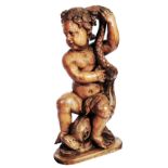 AN ANTIQUE CENTURY CARVED WOODEN FIGURE of a cherub with a sea creature, possibly 17th Century,