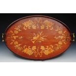 AN EDWARDIAN MAHOGANY OVAL TEA TRAY with floral marquetry musical instrument and trailing flower