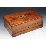 A VICTORIAN BURR WALNUT TRAVELLING WRITING DESK with fitted interior and inset brass handle, 38cm